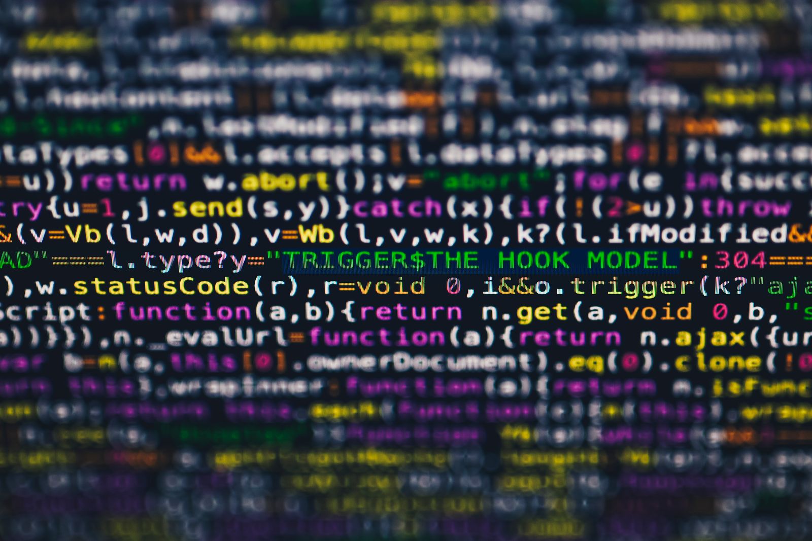 Code coloré affiché sur un écran sombre avec une ligne surlignée
